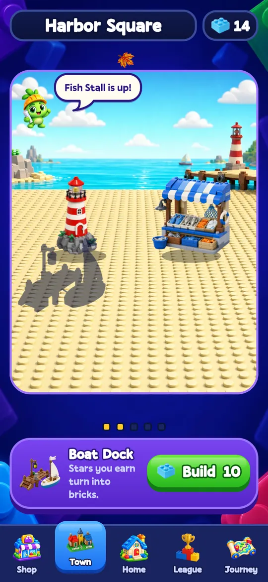 Harbor Square with a lighthouse and a fish stall built from toy bricks.